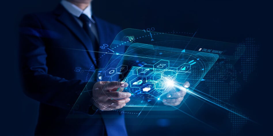 Person in a suit holding a glowing glass tablet screen